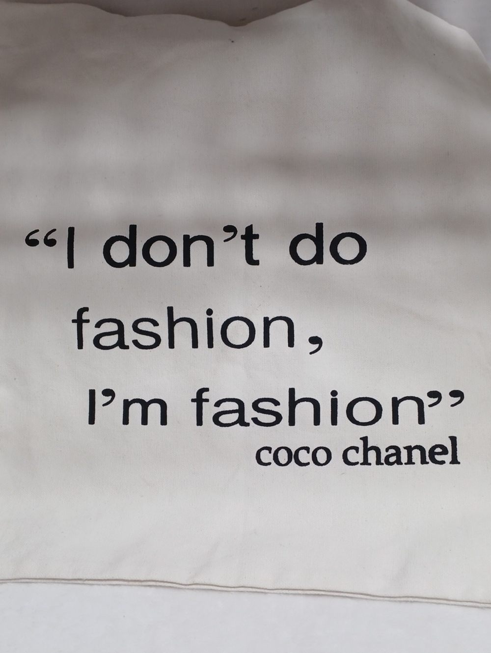 Fashion Canvas tote bag featuring a quote attributed to Coco Chanel